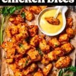 Air fryer chicken bites with honey mustard served on the side.
