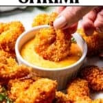 Dipping a coconut shrimp into a small bowl of spicy mayo dipping sauce, with text overlay of the recipe title.