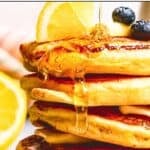 Photo of lemon ricotta pancakes with the recipe title in a text overlay. Photo by diethood.com