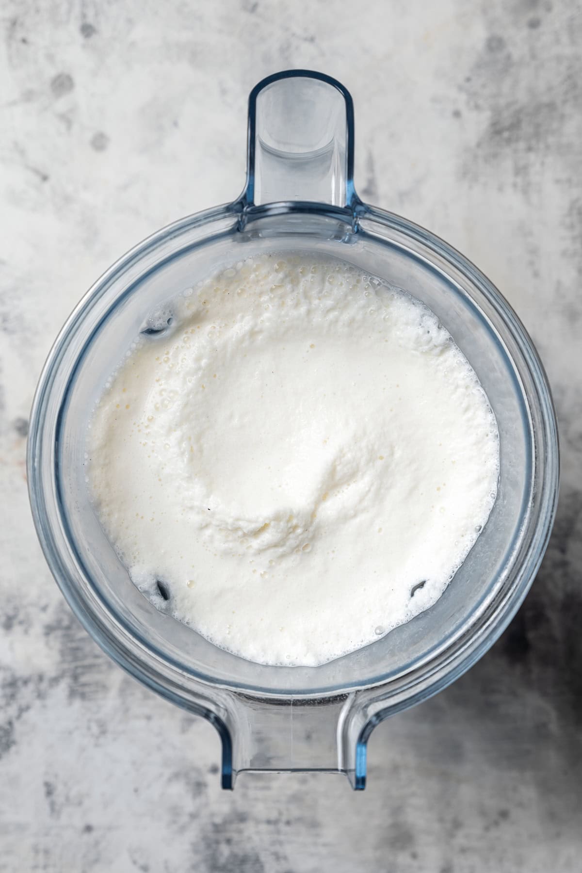 Vanilla bean frappuccino blended inside a food processor.
