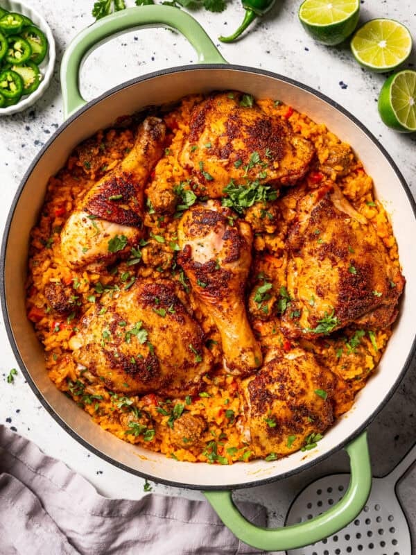 Overhead view of a large pot of arroz con pollo.