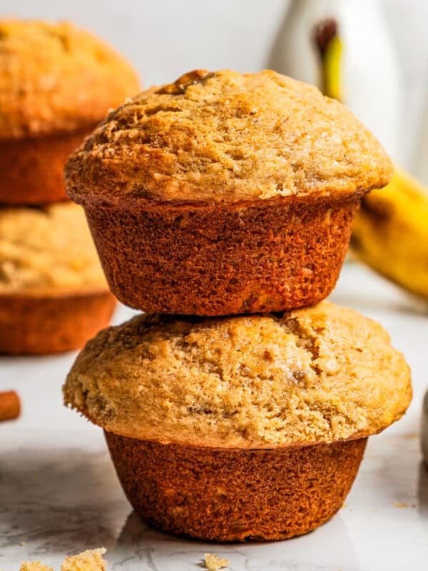 Two banana muffins stacked up.