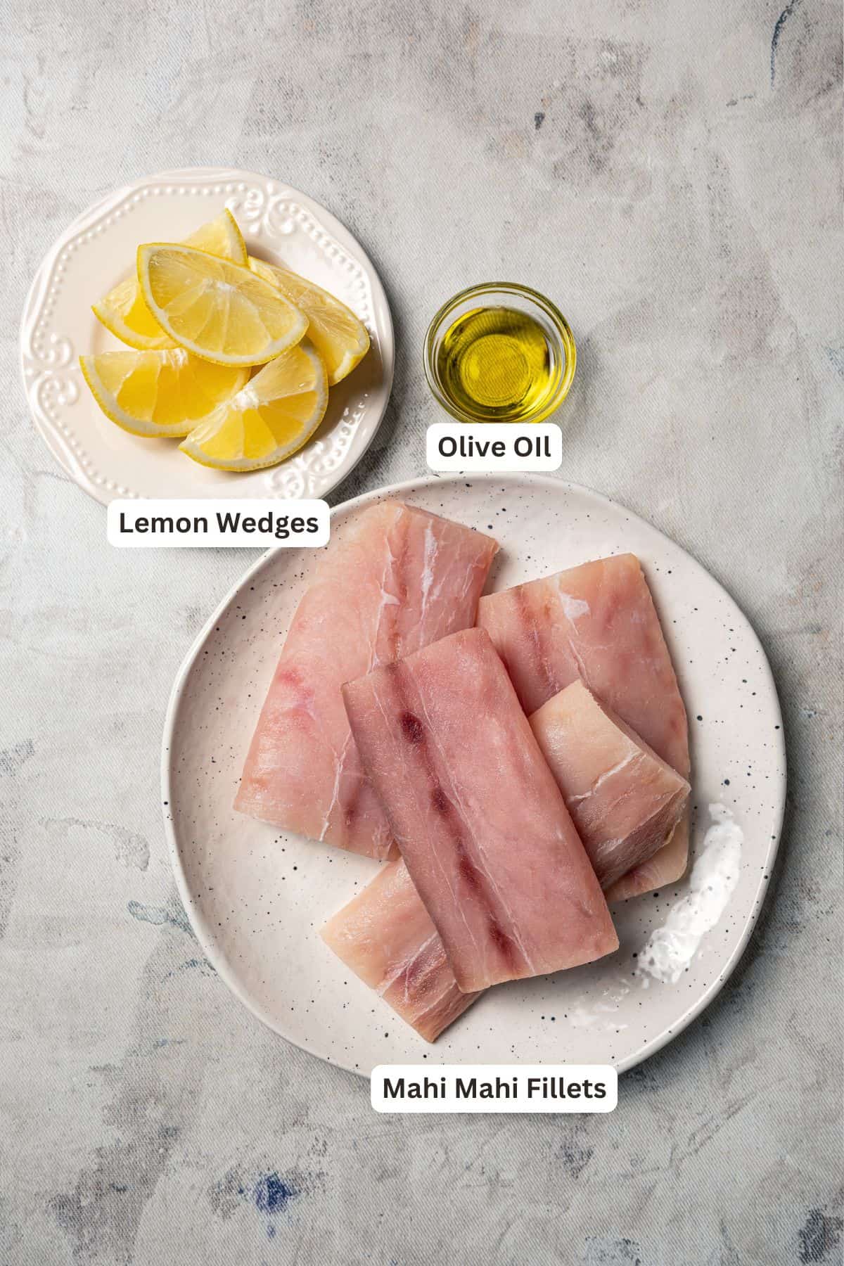 Blackened mahi mahi is a quick fish dish packed with Southern flavor thanks to a spicy homemade Cajun seasoning rub. Great for weeknights! Blackened mahi mahi ingredients with text labels overlaying each ingredient.