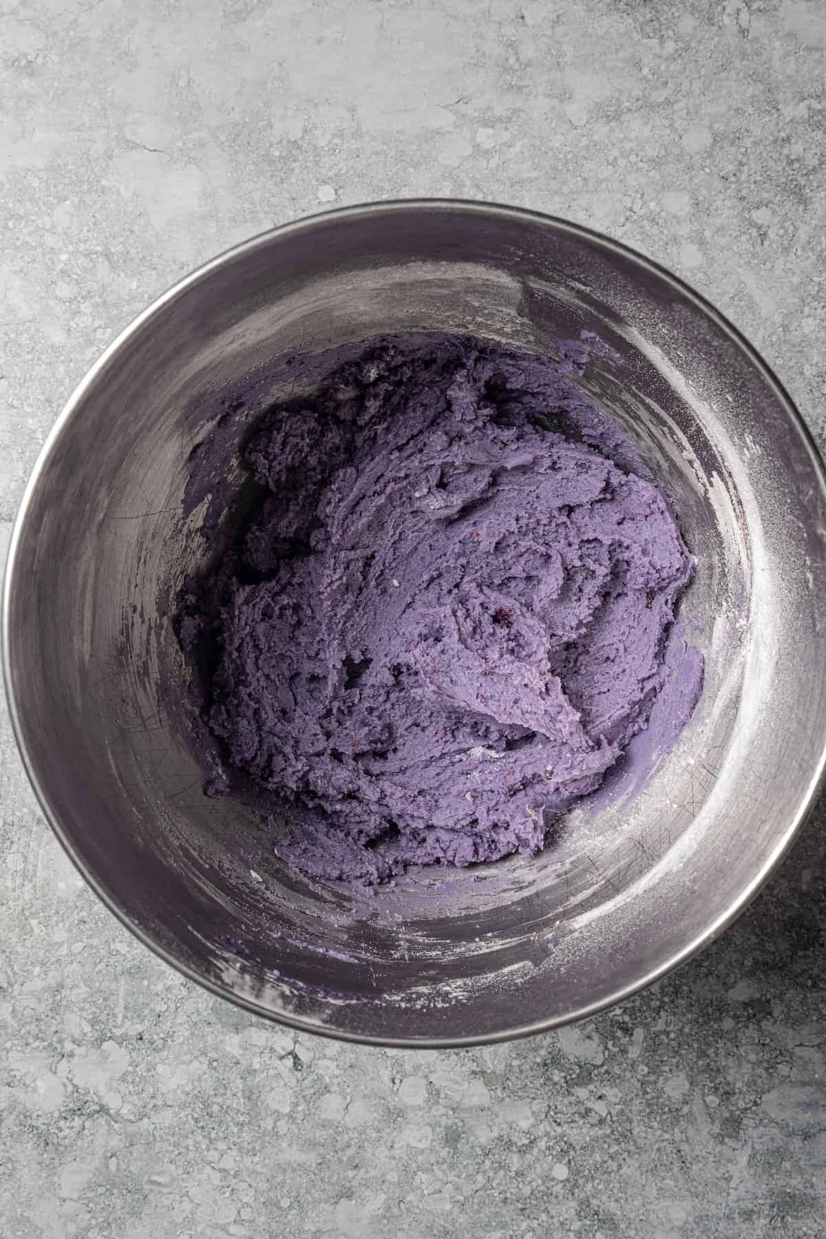 Blueberry cookie dough in a bowl.