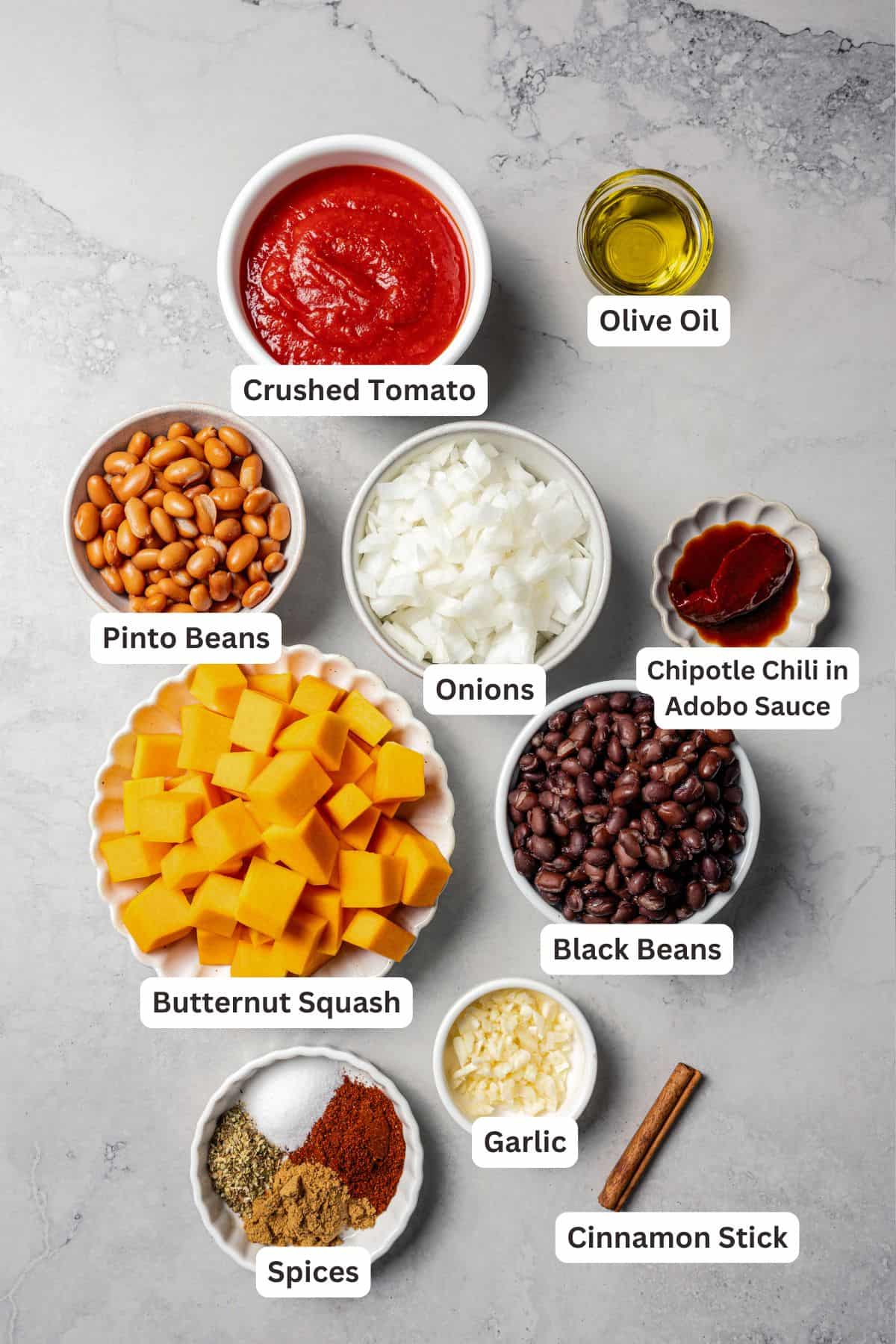 Butternut squash chili ingredients with text labels overlaying each ingredient.