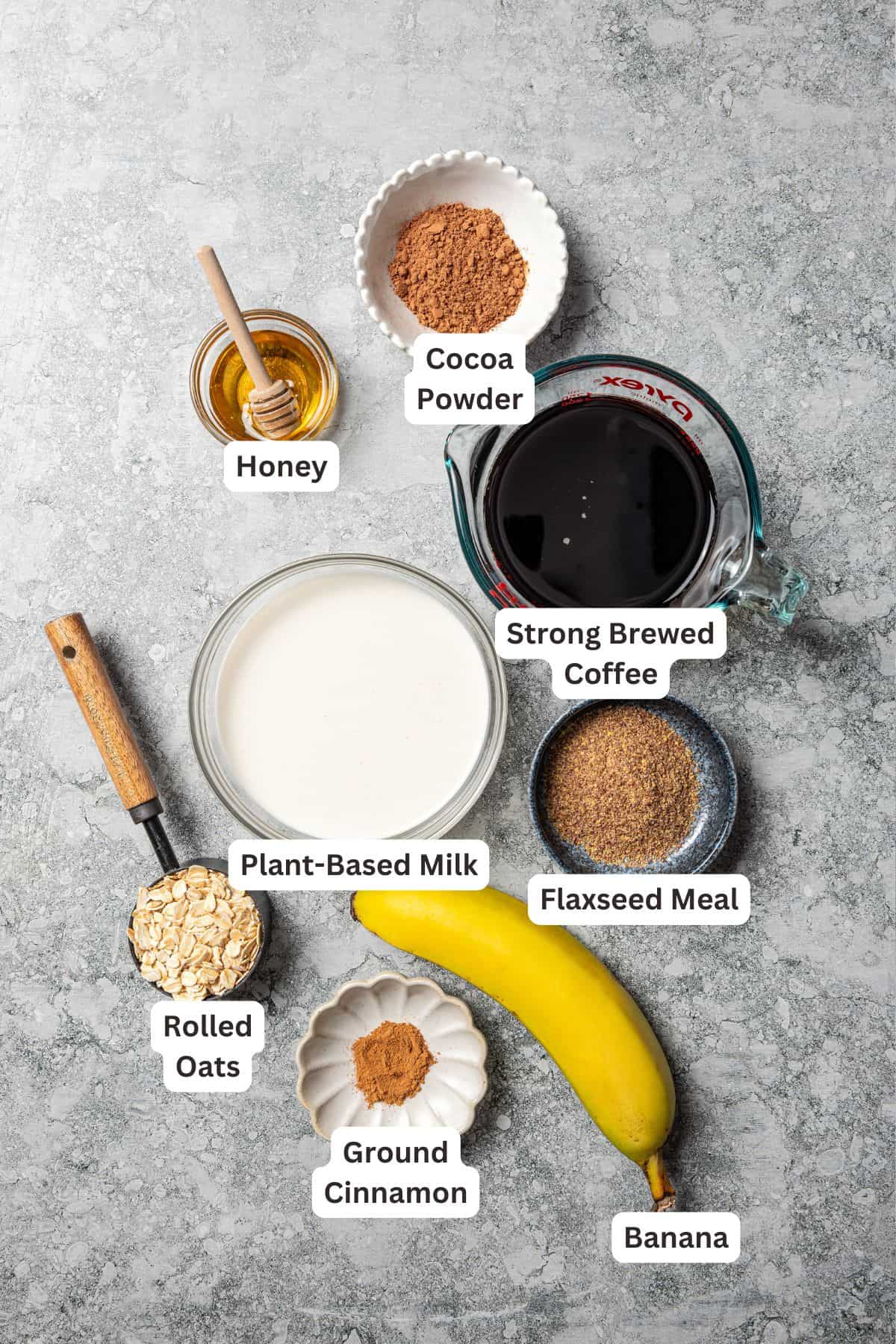 Coffee smoothie ingredients with text labels overlaying each ingredient.