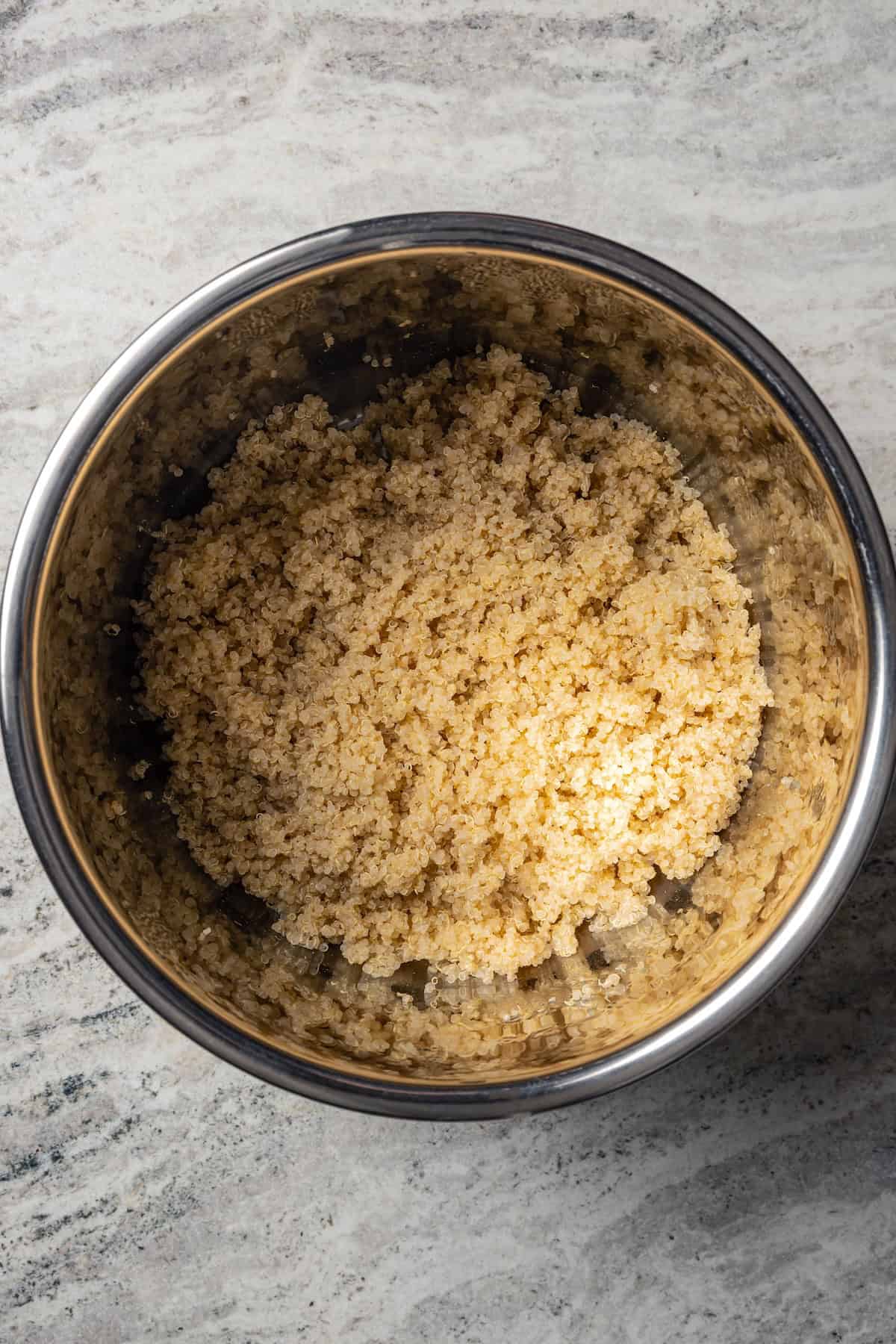 Cooked quinoa inside the Instant Pot.