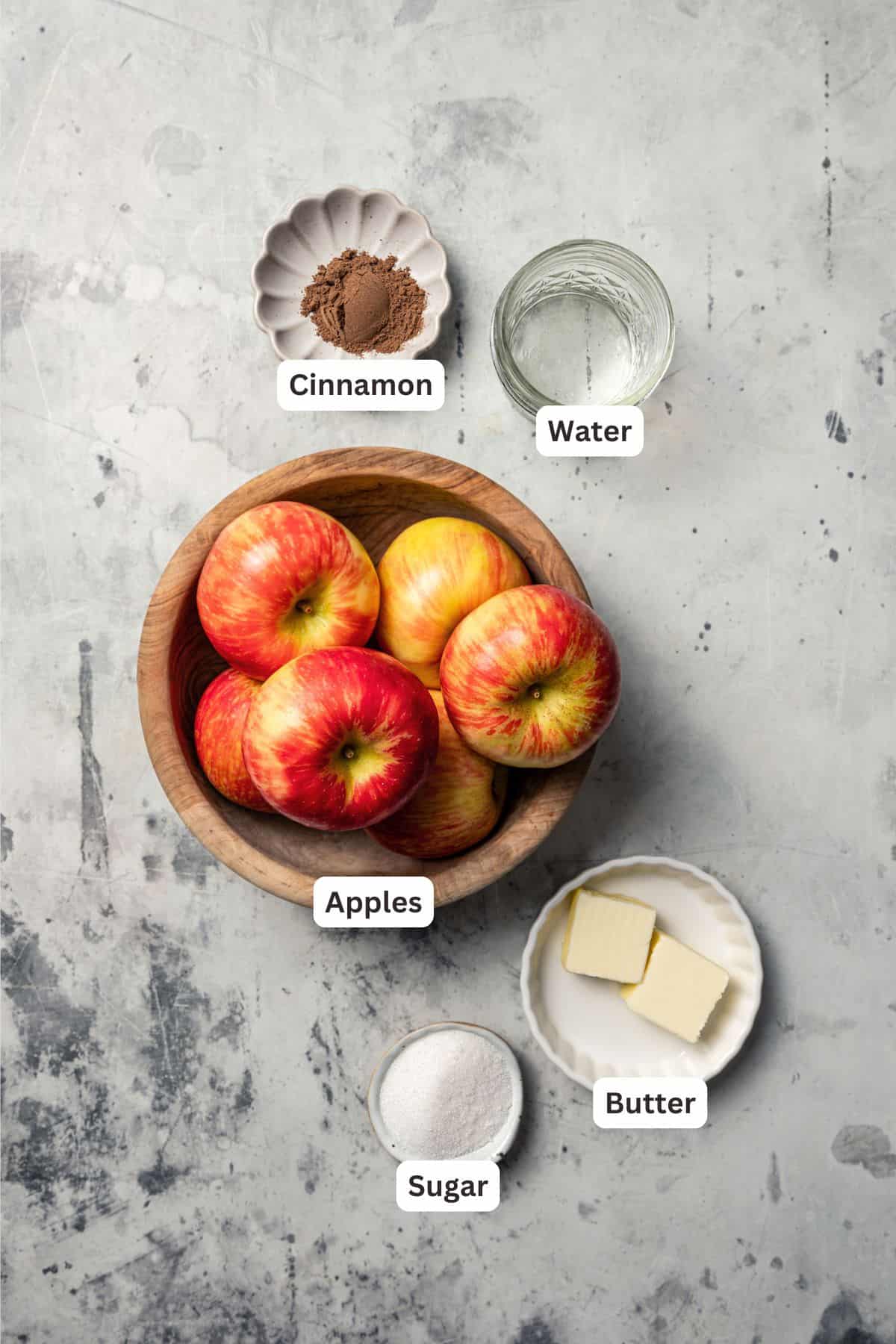 Cinnamon apples ingredients with text labels overlaying each ingredient.
