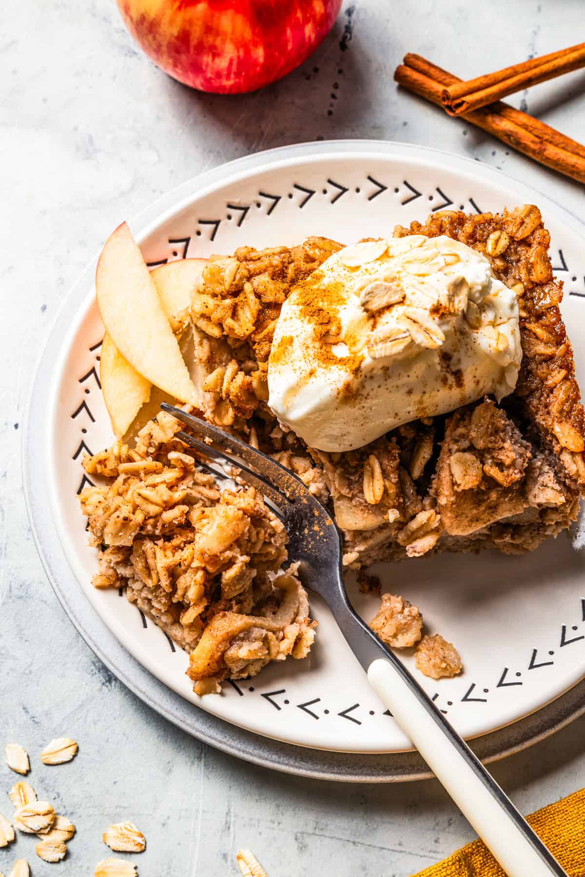 A fork cutting into baked oatmeal.