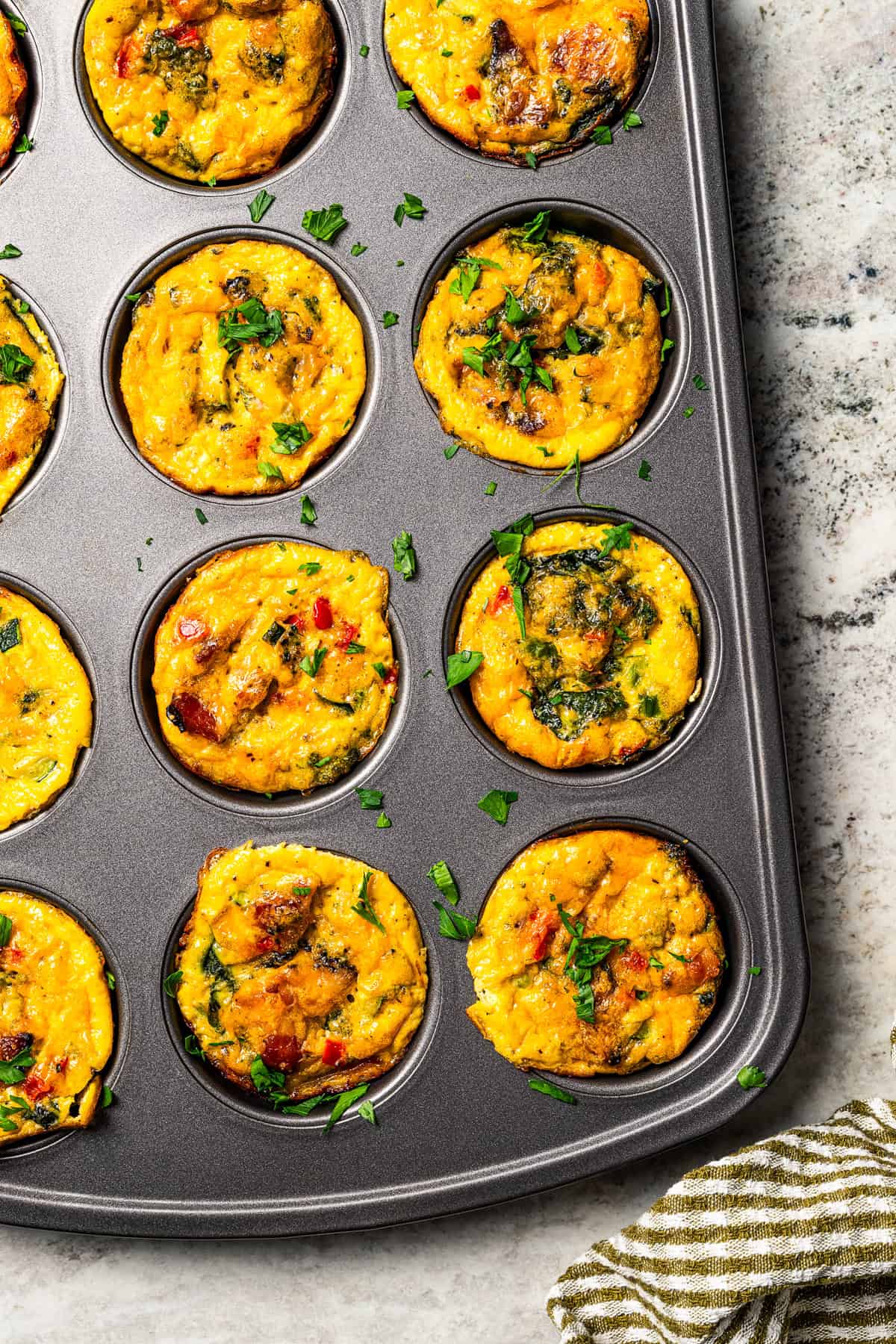 Baked egg bites in a muffin pan.