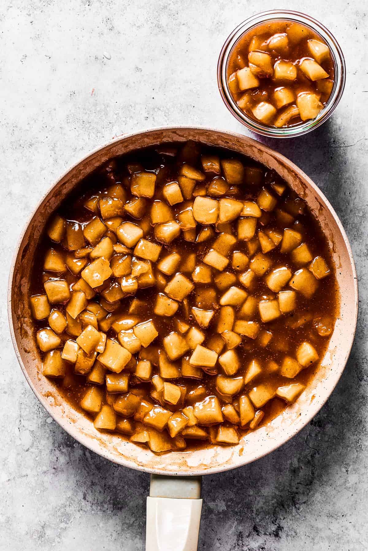 Weekly Meal Plan Diced apple pie filling in a skillet.