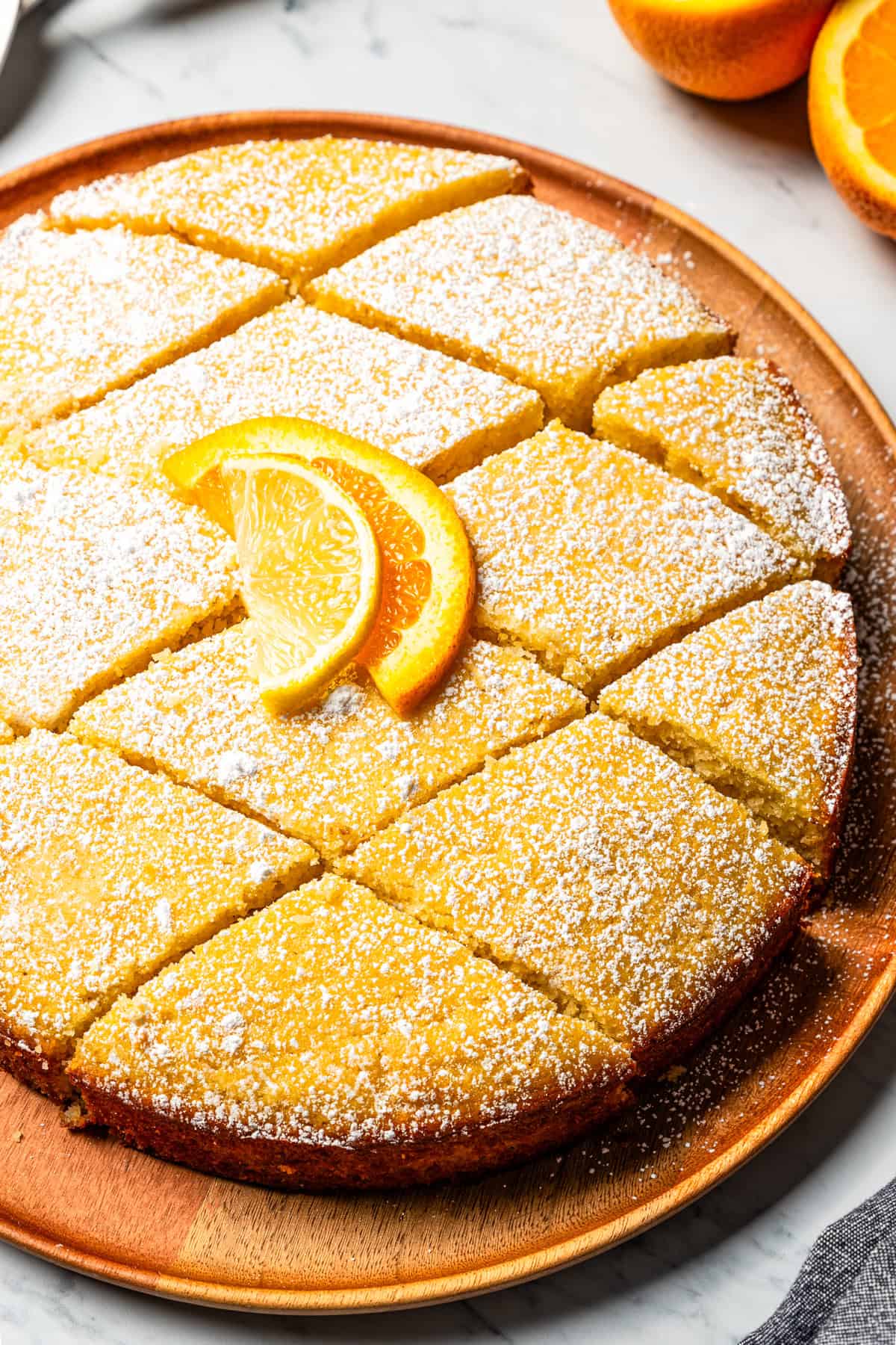 A whole semolina cake cut into a diamond pattern.