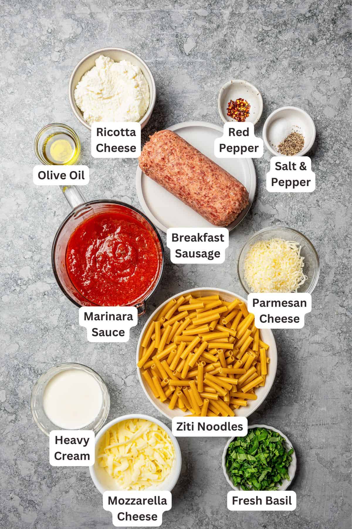 My easy baked ziti recipe is a weeknight-friendly pasta casserole with rich homemade meat sauce and three kinds of melty Italian cheese. Baked ziti ingredients with text labels overlaying each ingredient.