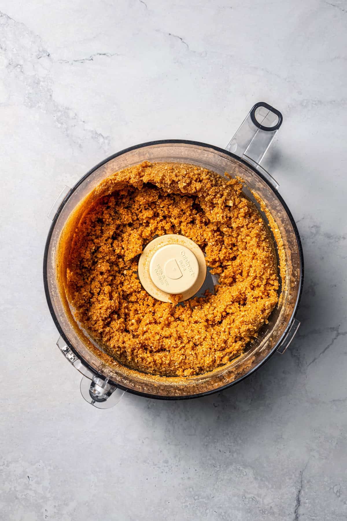 This churro cheesecake bars recipe is an easy dessert with layers of cinnamon sugar, a flaky pastry crust, and creamy cheesecake filling. Cinnamon sugar cookie crust combined in a food processor.