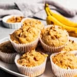 Banana nut muffins served on a platter.