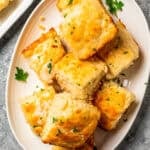 Biscuits stacked on a platter.