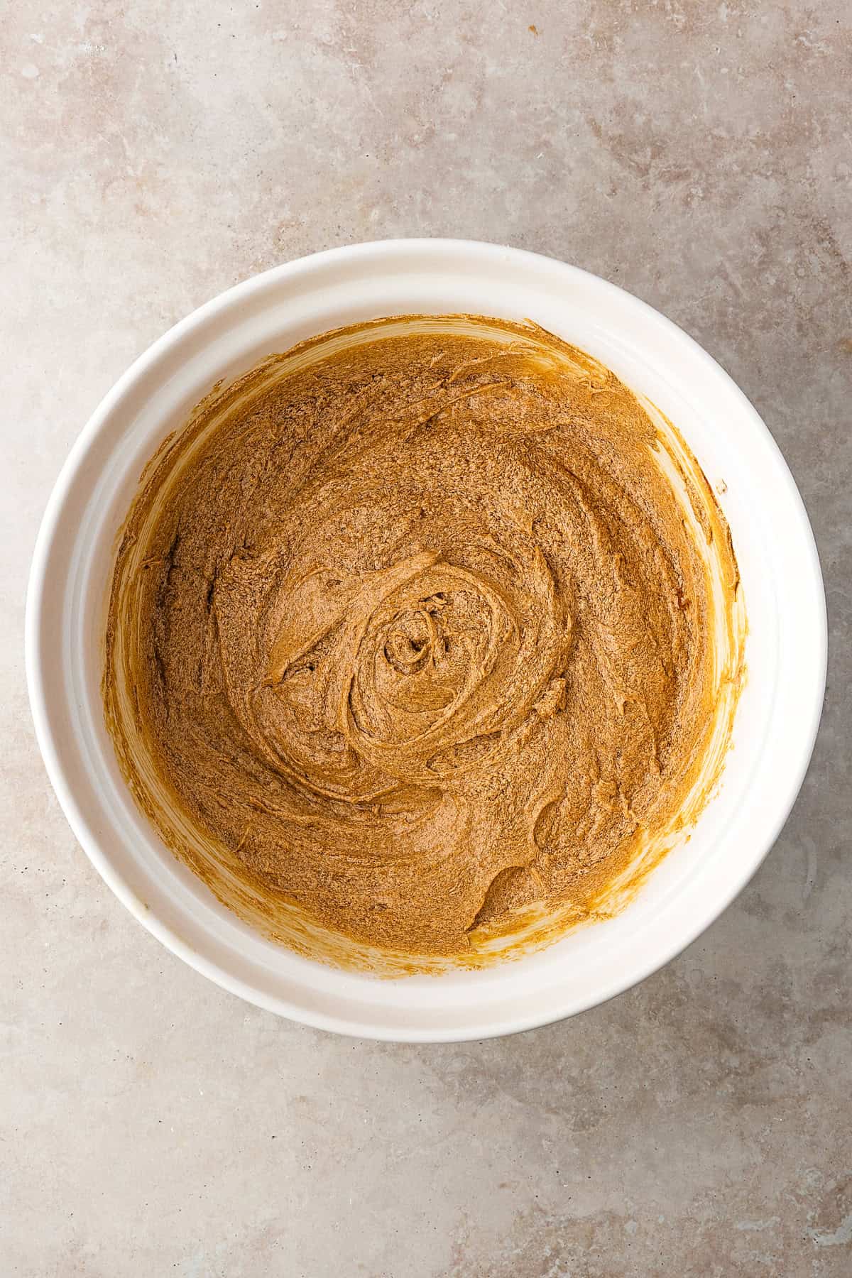 Thick, chewy, and soft gingerbread cookies flavored with warm spices and molasses. They're festive, cozy, and so easy to make for the holidays. Making cookie dough for gingerbread cookies.