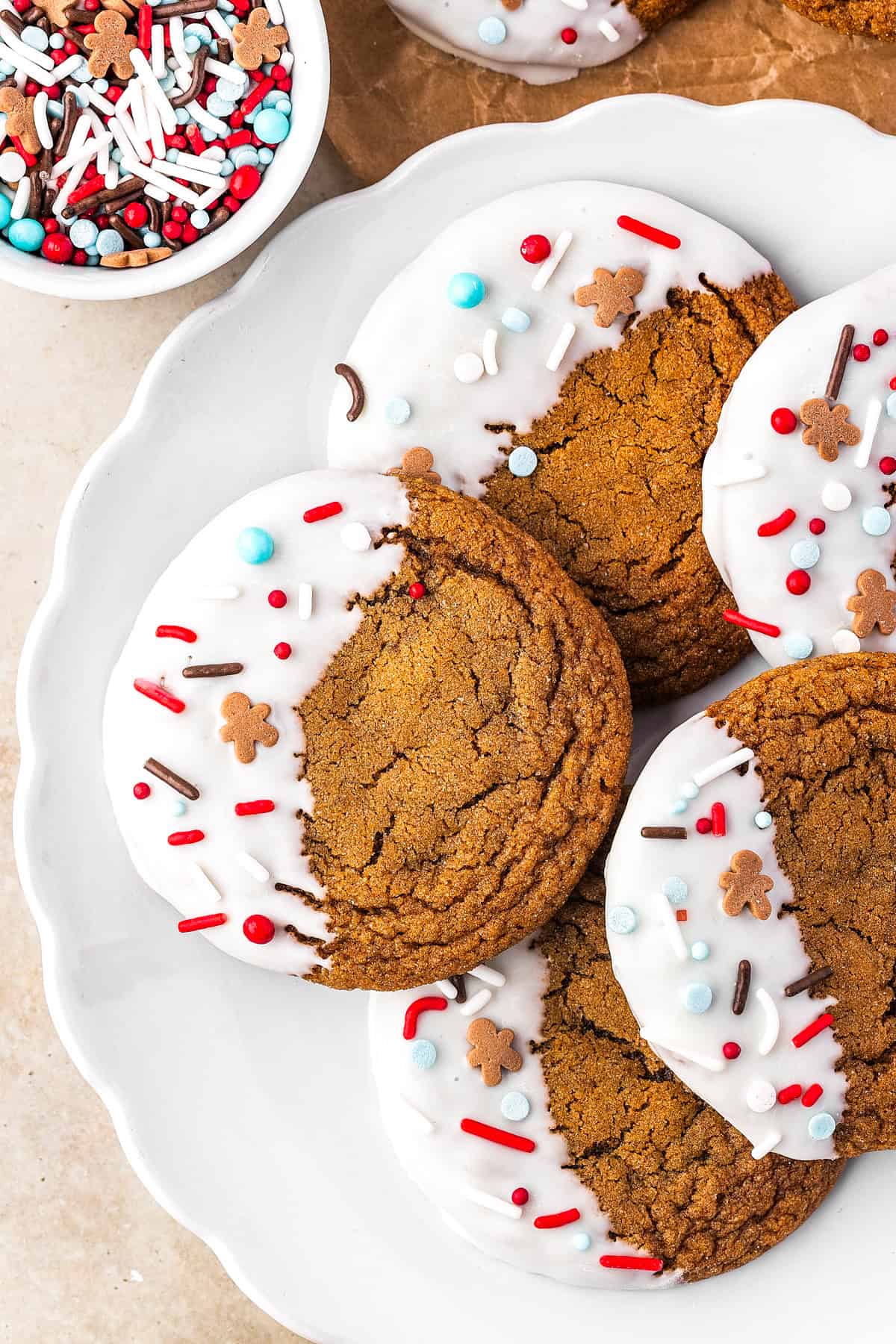 Thick, chewy, and soft gingerbread cookies flavored with warm spices and molasses. They're festive, cozy, and so easy to make for the holidays. Christmas cookies served on a plate.