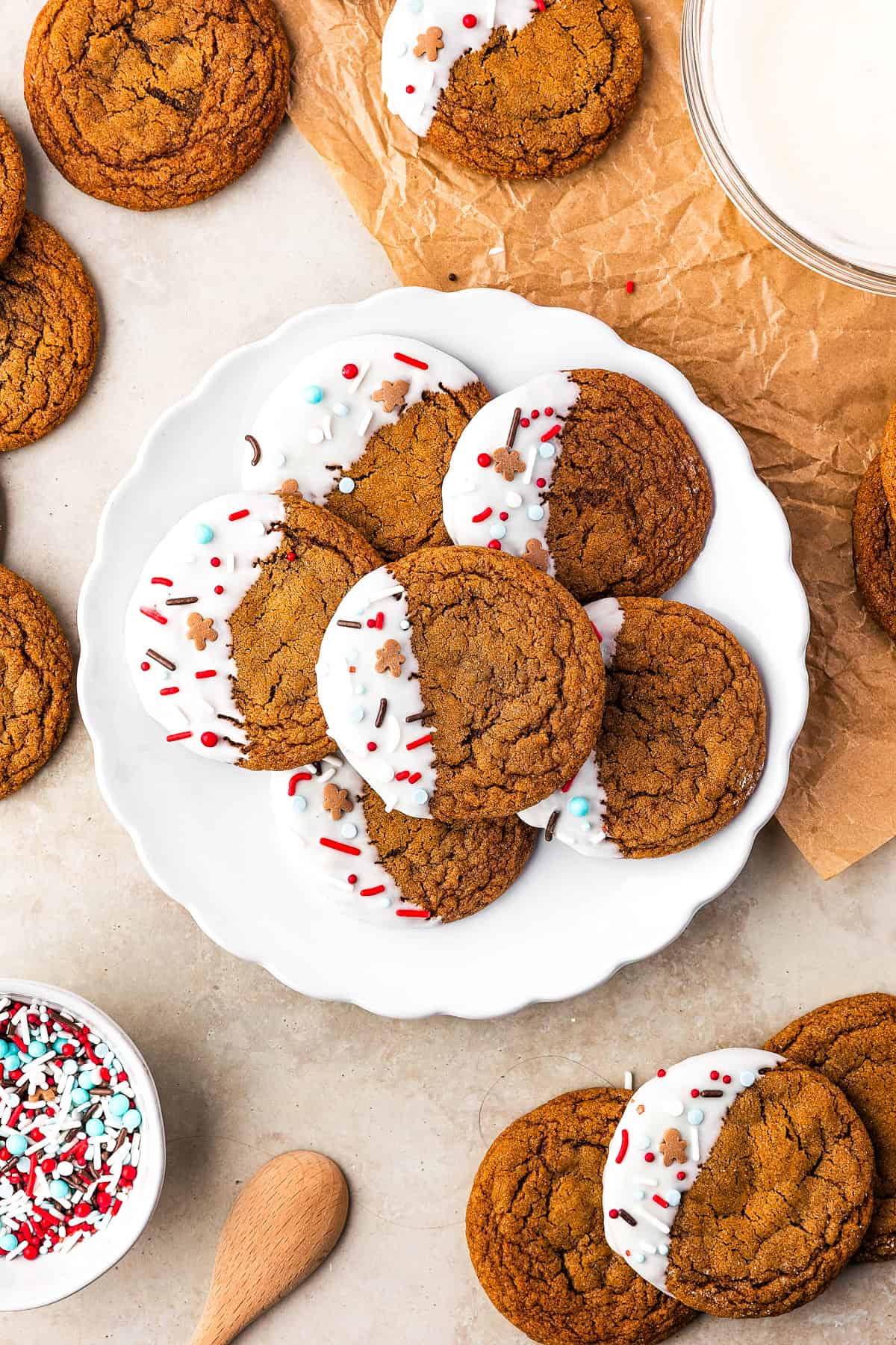 Thick, chewy, and soft gingerbread cookies flavored with warm spices and molasses. They're festive, cozy, and so easy to make for the holidays. Gingerbread cookies served on a plate.