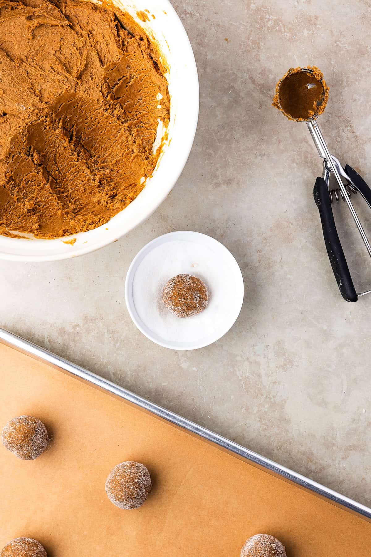 Thick, chewy, and soft gingerbread cookies flavored with warm spices and molasses. They're festive, cozy, and so easy to make for the holidays. Shaping cookie dough into balls.