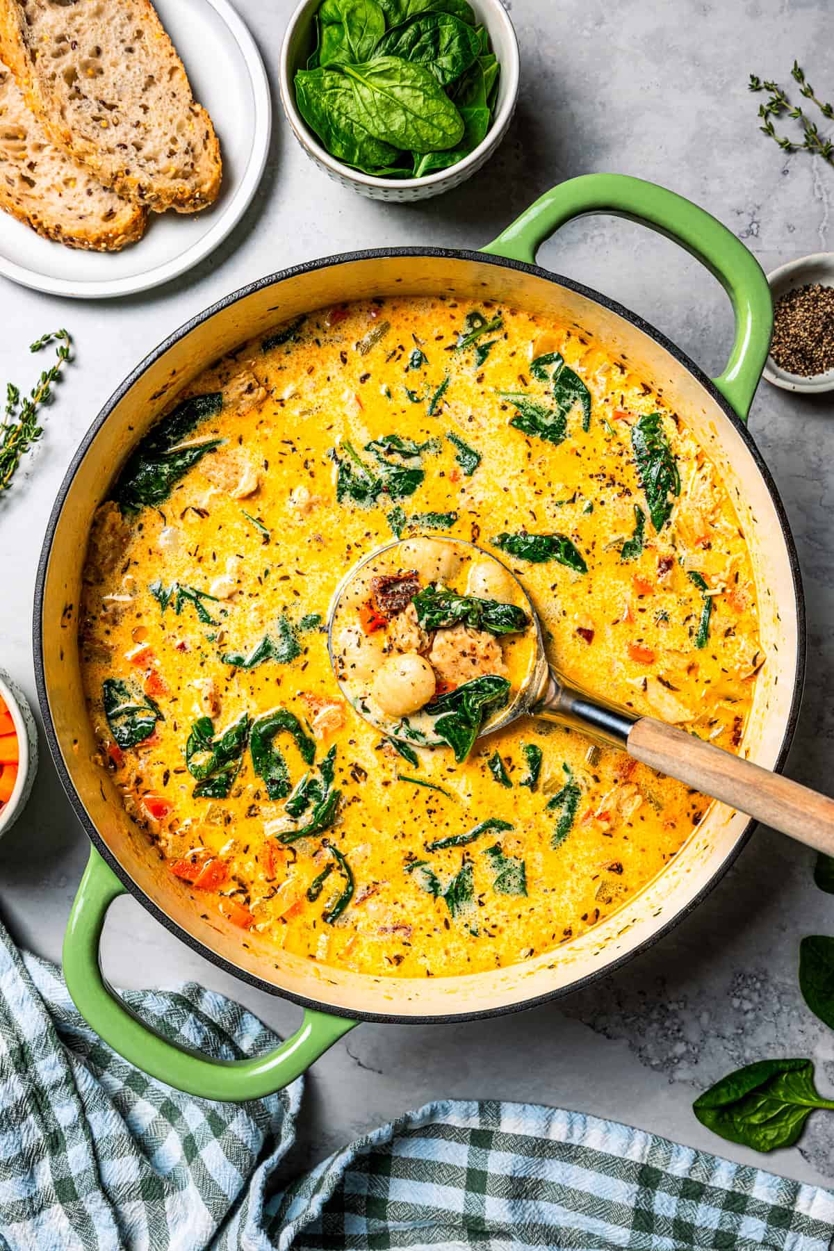 This chicken gnocchi soup is even better than the Olive Garden! It's ready in 20 minutes, extra creamy, and packed with flavorful ingredients. Chicken gnocchi soup in a large cooking pot.