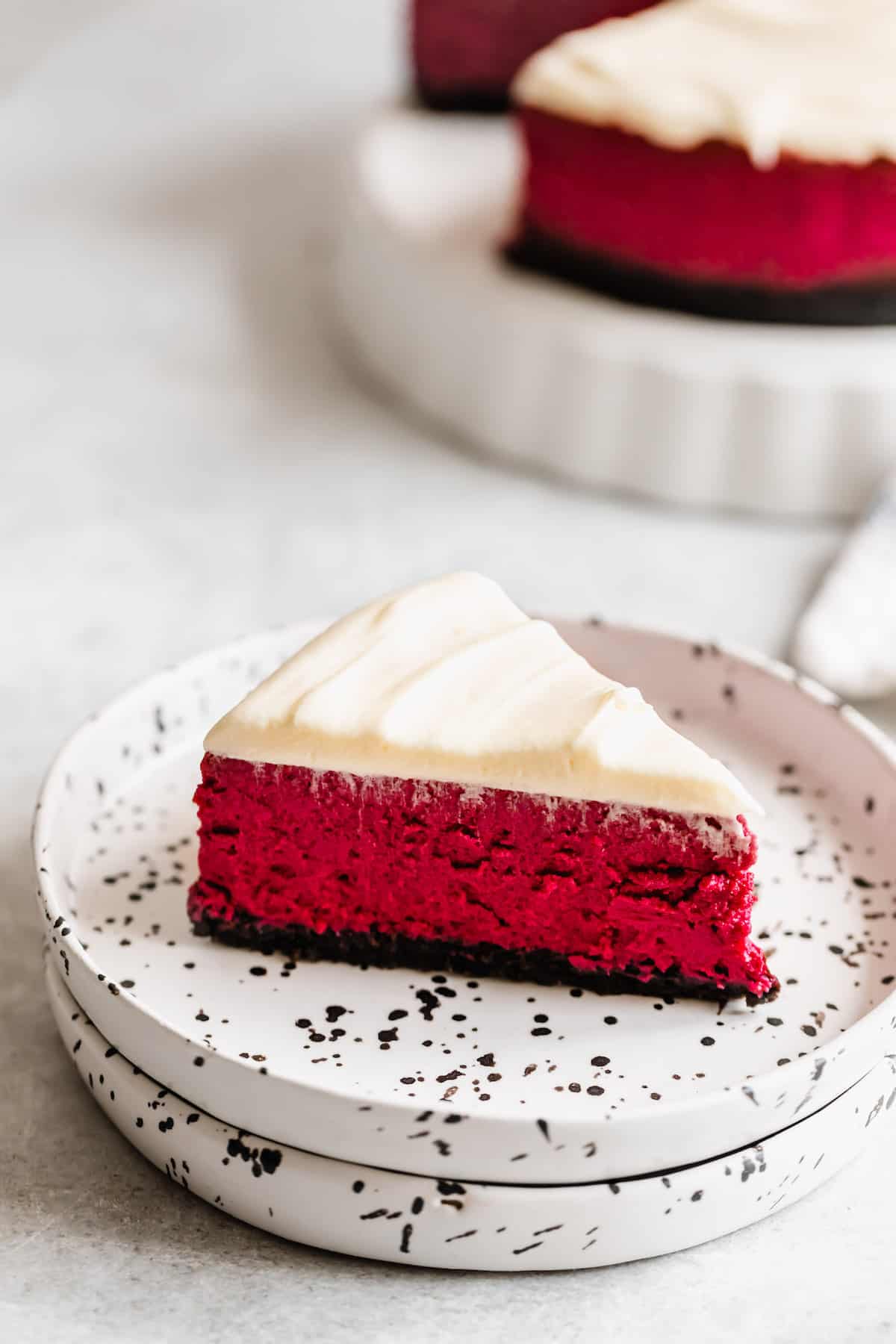 Weekly Meal Plan A slice of red velvet cheesecake on a plate.