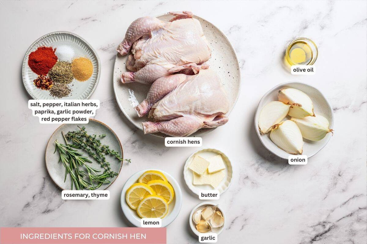 This easy Cornish hen recipe is perfectly juicy and golden-brown, rubbed with savory spices and oven-roasted over a bed of lemon and herbs. Cornish hen recipe ingredients with text labels overlaying each ingredient.