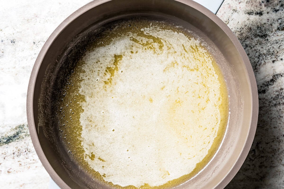 Melted butter in a saucepan.