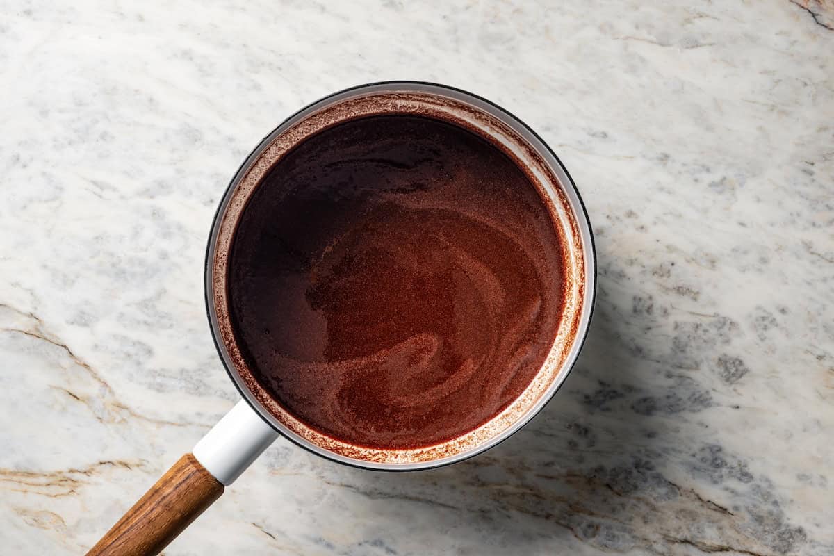 Melted chocolate in a sauepan.