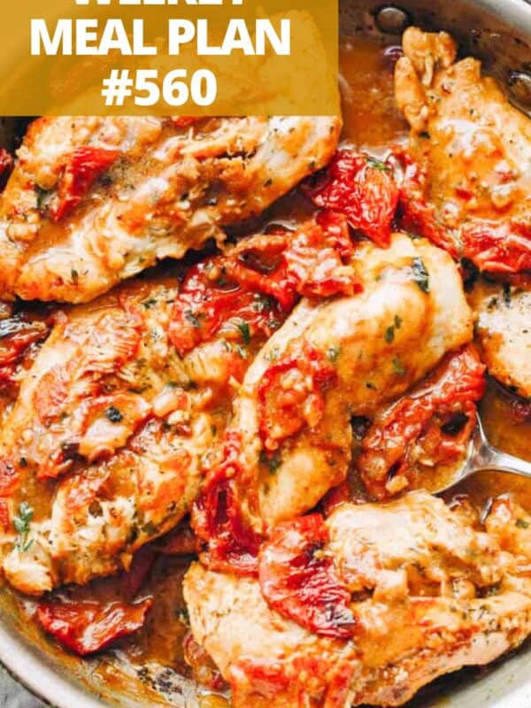 A skillet with pan seared chicken breasts tossed with sundried tomatoes and a creamy sauce.