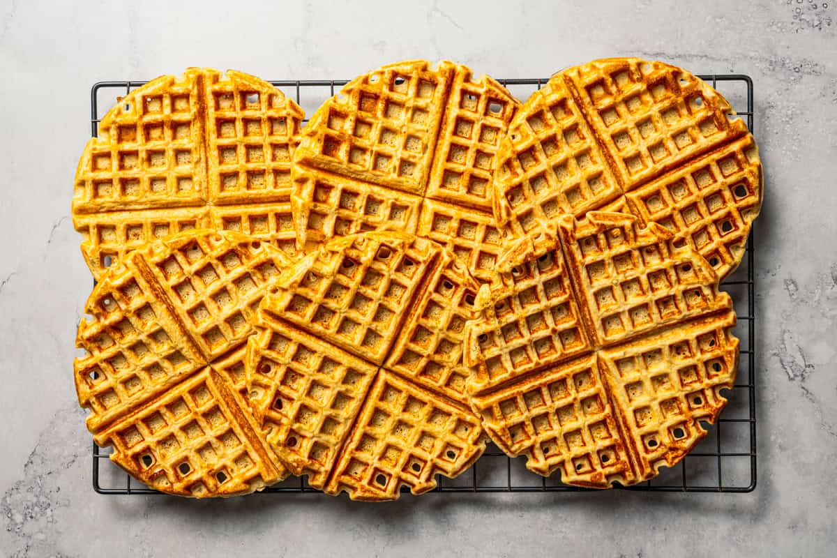 Protein waffles arranged on a wire rack.