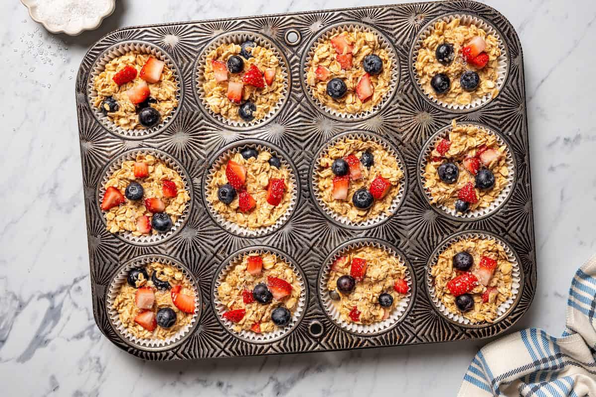 Make this cream cheese stuffed French toast with thick slices of custard-dipped brioche filled with sweet mascarpone and fresh lemon zest. Berry oatmeal portioned into a lined muffin pan.