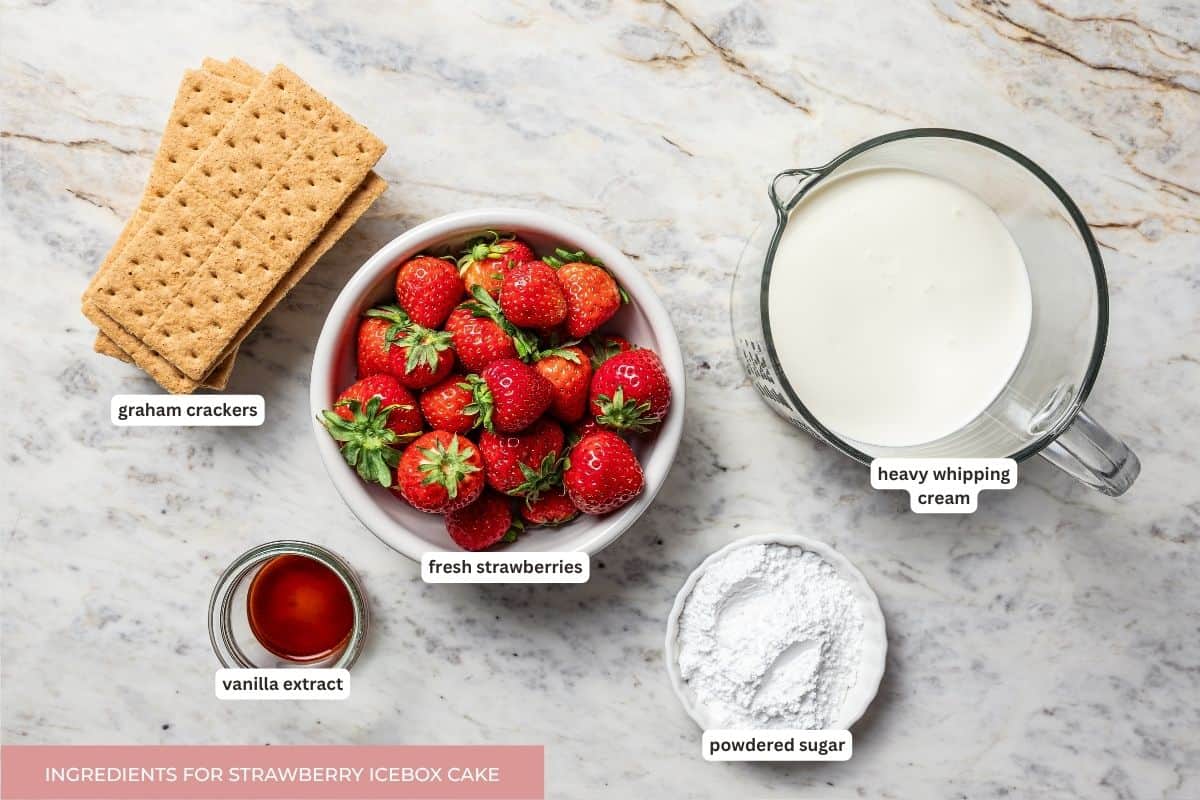 This no-bake strawberry icebox cake is an easy overnight dessert with layers of graham crackers, fresh strawberries, and fluffy whipped cream. Strawberry icebox cake ingredients with text labels.