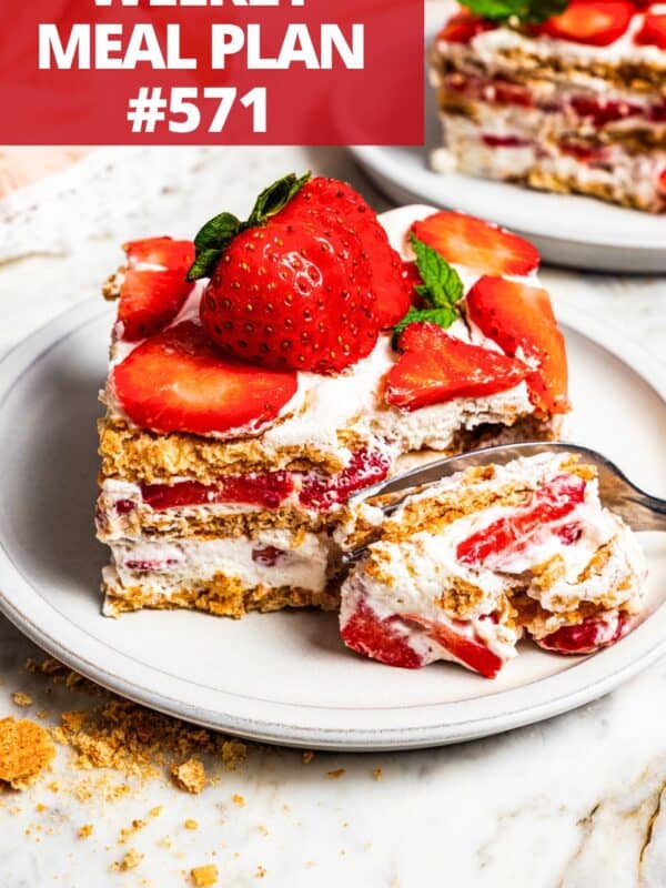 A slice of a layered strawberry icebox cake.