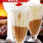 Root beer float served in a diner-style drinking glass.