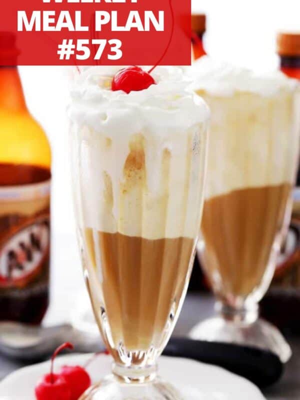 Root beer float served in a diner-style drinking glass.