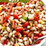 A bowl of cannellini bean salad.