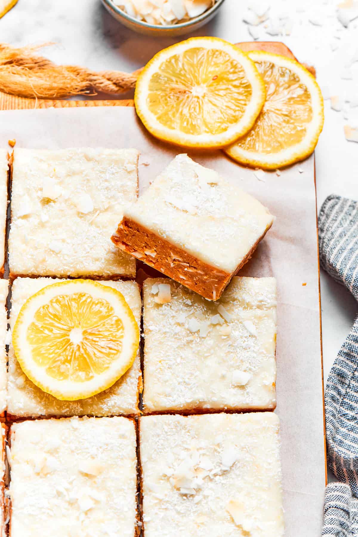 Weekly Meal Plan A no-bake Lemon slice dessert cut into squares.