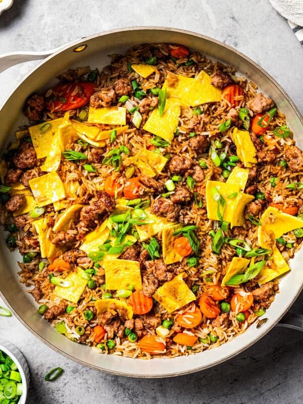 Homemade pork fried rice in a skillet.