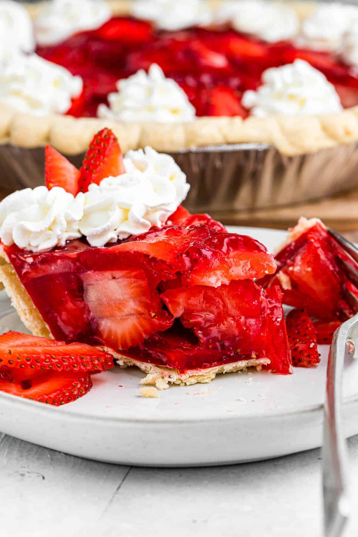 Weekly Meal Plan A slice of strawberry pie with fresh strawberries.