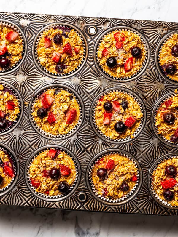 Baked oatmeal cups in a muffin pan.