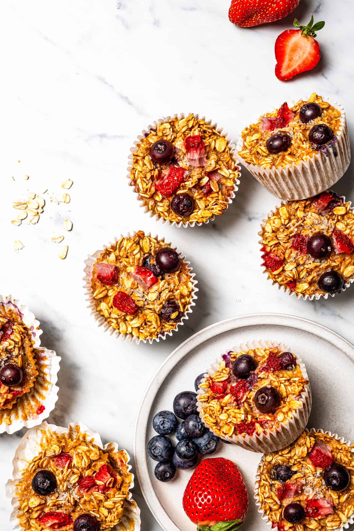 Make this cream cheese stuffed French toast with thick slices of custard-dipped brioche filled with sweet mascarpone and fresh lemon zest. Assorted baked oatmeal cups scattered on a countertop.