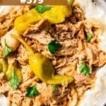 Pulled Mississippi chicken served over mashed potatoes.
