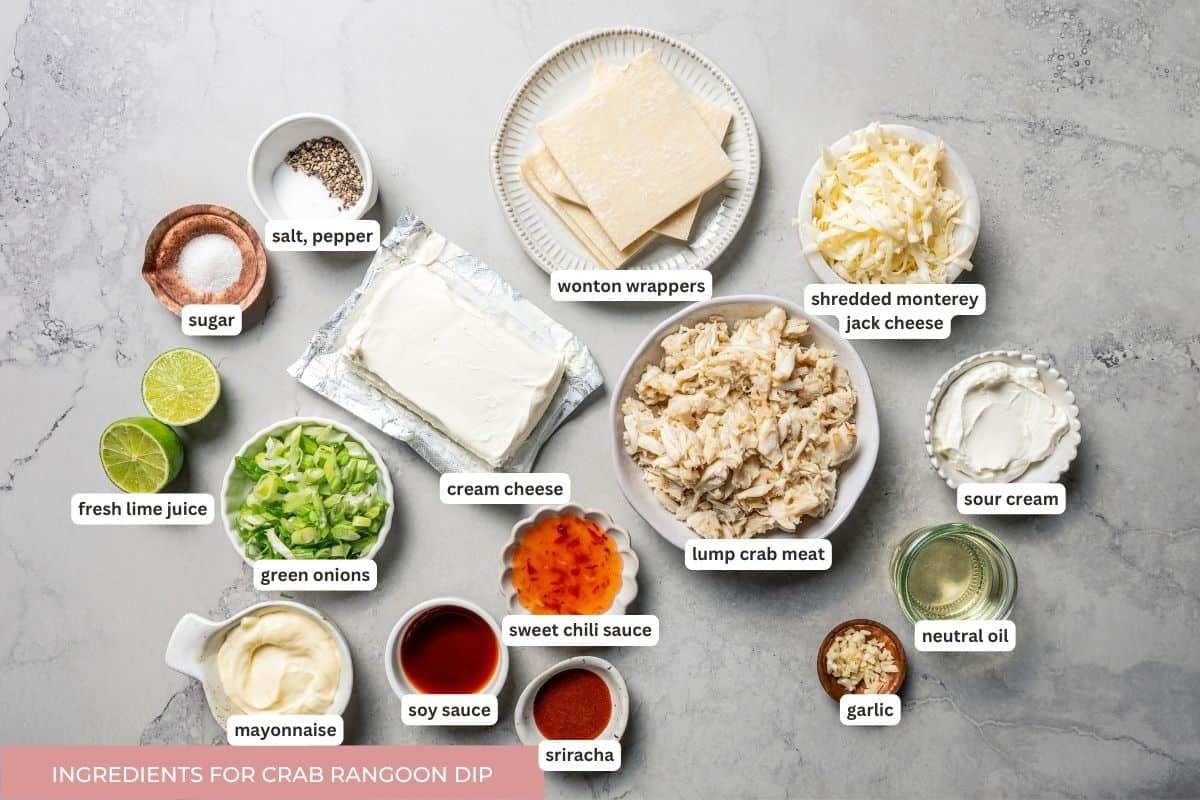 Crab rangoon dip has all those creamy flavors in an easy baked crab dip with cream cheese, sweet chili, green onion, and crispy wonton chips. Crab rangoon dip ingredients with text labels.