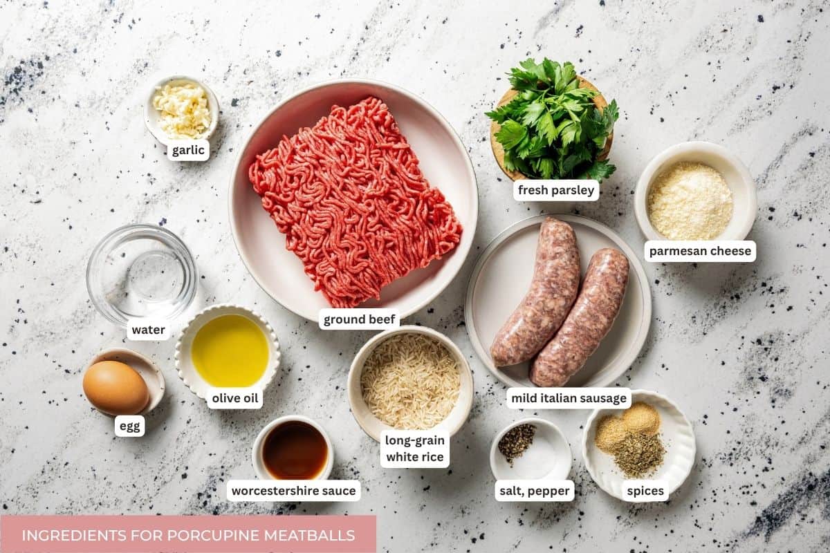 Not your old-fashioned porcupine meatballs! Make these with juicy ground beef, sausage, rice, and herbs, cooked in homemade tomato sauce. Homemade porcupine meatballs ingredients with text labels.