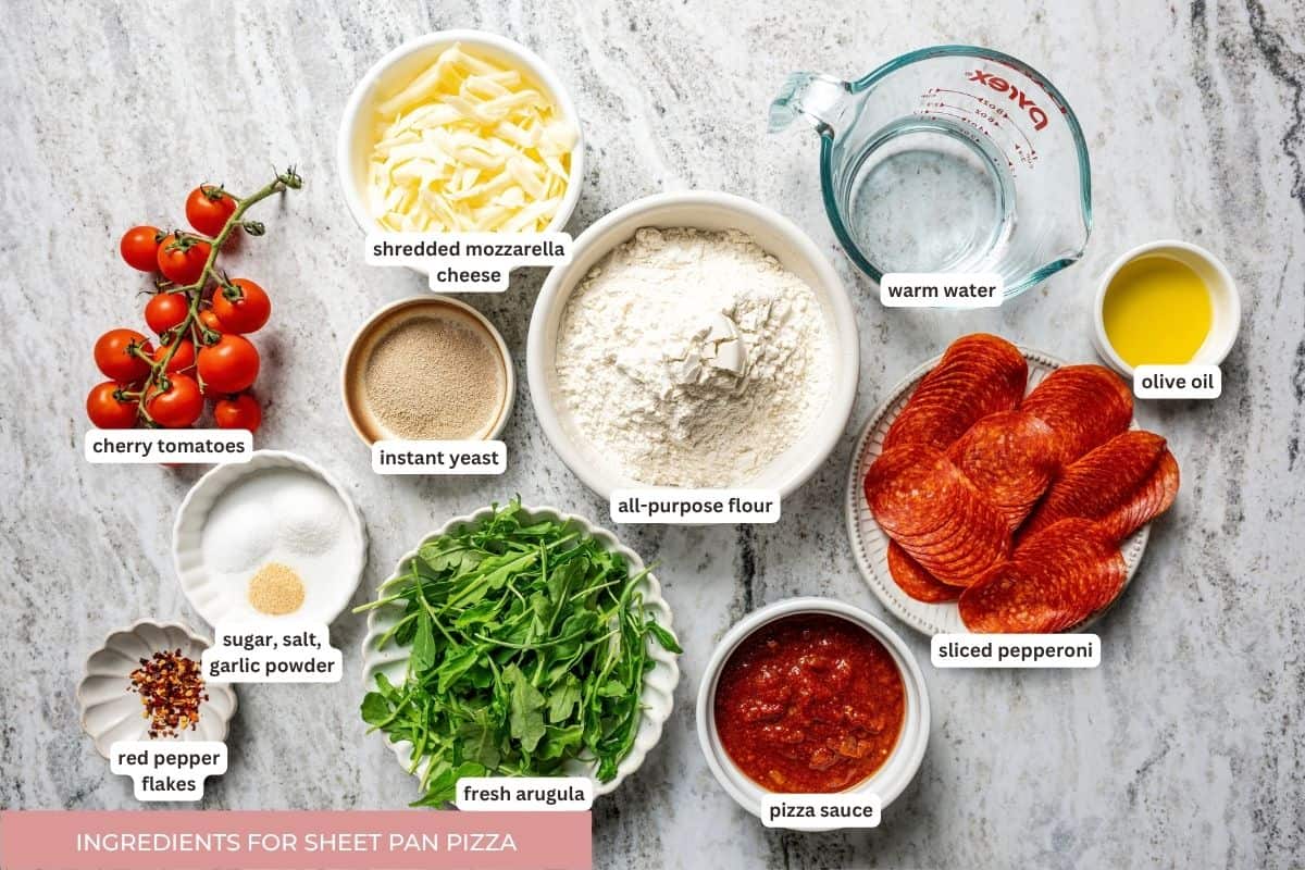 Make this golden, crispy sheet pan pizza recipe with easy homemade dough and your favorite flavorful toppings, like pepperoni and cheese. Sheet pan pizza ingredients with text labels.